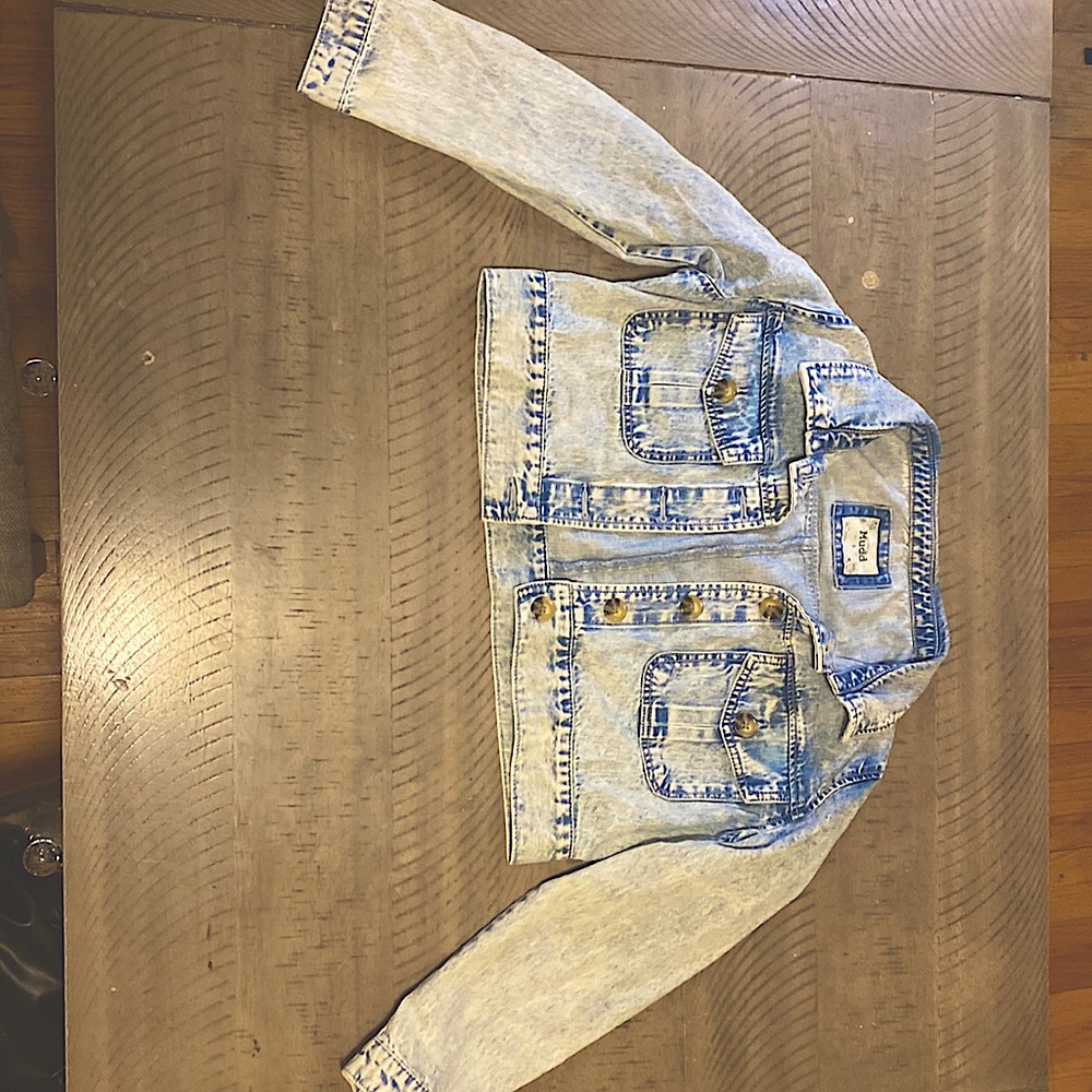 This is a denim jacket that is size small.